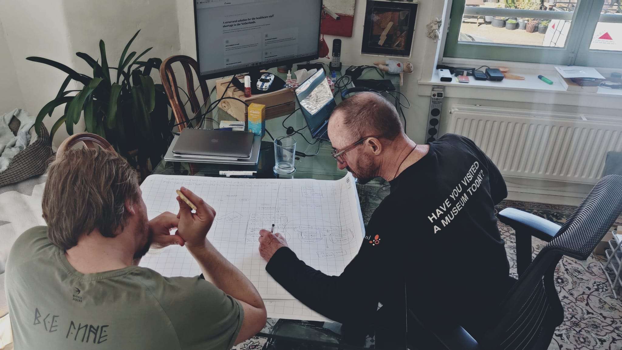 Yevhenii Butov and Bruno Servaege during a work meeting